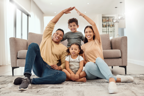 Family making the shape of a house